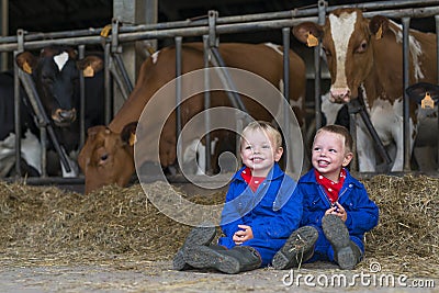 Children work on the farm Stock Photo