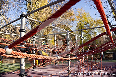 Children& x27;s playground for active games. A slide of ropes as a device for climbing up. Close-up Stock Photo