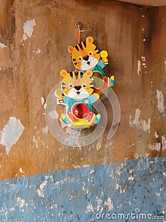 Childs lantern, wall art amid the urban decay, D4 HCMC, Vietnam Stock Photo