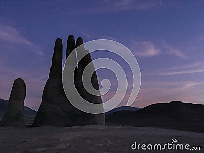 Chile atacama hand statue night Stock Photo