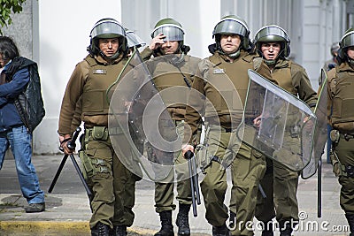 Chilean riot police in action. Editorial Stock Photo