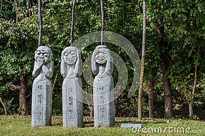 Speak no evil, hear no evil, see no evil totem poles Editorial Stock Photo