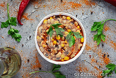 Chili con carne in a bowl. Mexican cuisine. Chili with meat, corn and beans Stock Photo