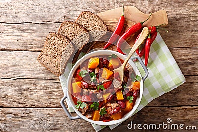 Chili con carne with pumpkin closeup in the pan. horizontal top Stock Photo