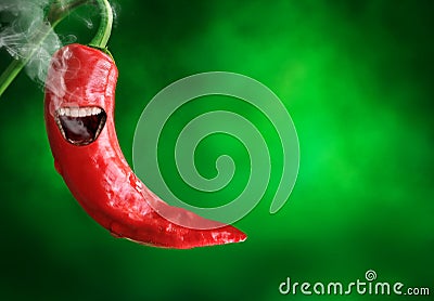 Chili pepper having a mouth with smoke coming out of it Stock Photo