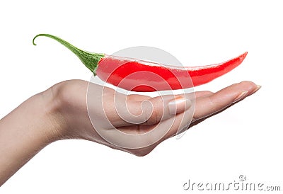 Chili pepper and human hand Stock Photo