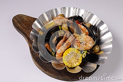 CHILI SAMBAL SHRIMPS BUCKET in a dish top view on grey background singapore food Stock Photo