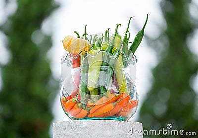 Chili, vegetables, in glass jars. Stock Photo