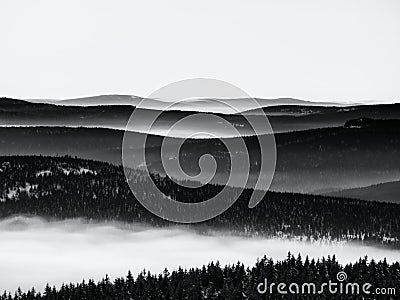 Chill inverse weather in winter mountains, heavy mist. Stock Photo