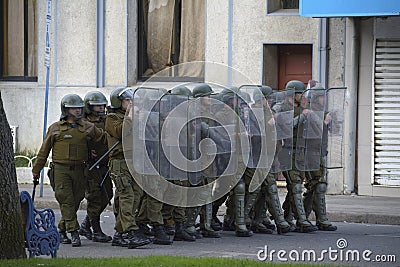 Riot police in Chillan, Chile Editorial Stock Photo