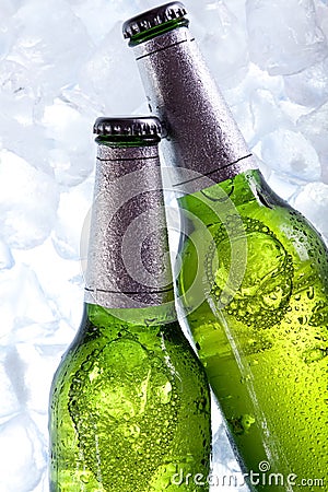 Chilled beer in ice! Stock Photo