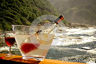 Chilled wine bottle and glass on the terrase again Stock Photo