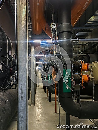 Chiller water pipe in mechanical room Stock Photo