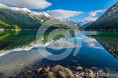 Chilliwack Lake with the reflecting Mount Redoubt Skagit Range Stock Photo