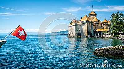 Chillon castle view with Swiss flag and Lake Geneva view in Switzerland Editorial Stock Photo