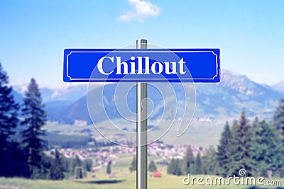 Chillout on blue street sign with landscape Stock Photo