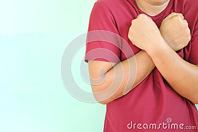 Chills, shaking, shivering, and feeling scared concept. Young Asian man shiver in cold. Stock Photo