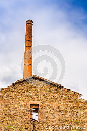Chimney of disused factory Stock Photo