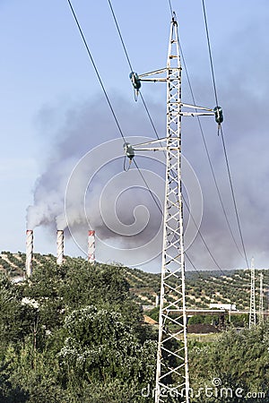 Chimney expelling pollutant gases to the air Stock Photo