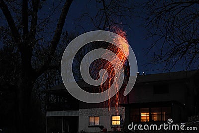Chimney Fire Sparks Burning Embers At Night 1 Stock Photo