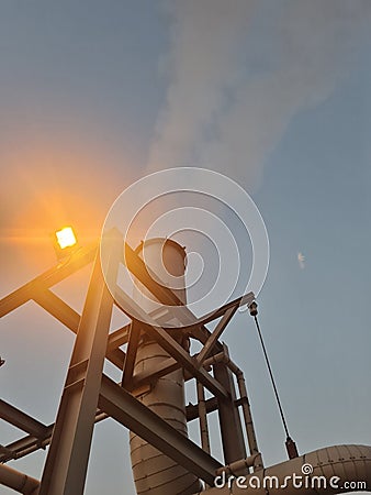 chimney silencer steam dawn sky Stock Photo