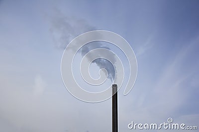 Chimney smoking stack. Air pollution and climate change theme. Stock Photo