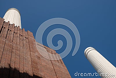 Chimneys at Battersea Power Station, renovated interwar building, now a mixed use retail and residential scheme. Stock Photo