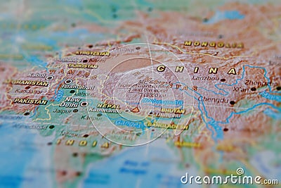 China in close up on the map. Focus on the name of country. Vignetting effect Stock Photo