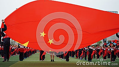 Chinese students do basketball GymnasticsChinese Students`Joining the Junior Team Ceremony Editorial Stock Photo