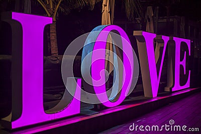 China, Hainan Island, Sanya bay - December 2, 2018: Happy Valentines Day greeting card or banner, Light led letter Love, editorial Editorial Stock Photo