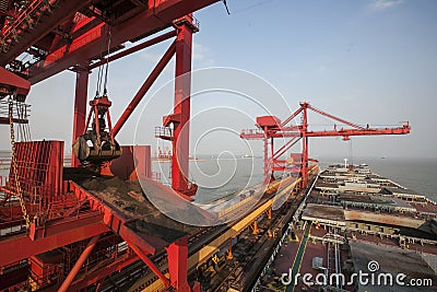 China Qingdao port and ton iron ore terminal Editorial Stock Photo