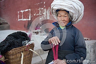 China's ethnic minorities, the Yi old lady Editorial Stock Photo