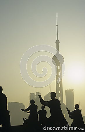 China Shanghai silhouettes of people against city skyline (Oriental Pearl TV Tower) Stock Photo