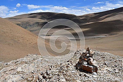 China, small pyramid of stones on the Tibetan plateau Stock Photo