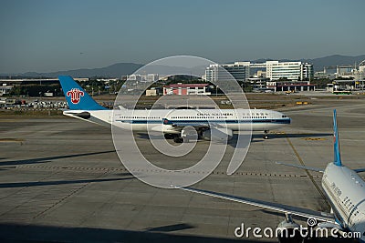 China Southern jets at Guangzhou Baiyun International Airport Editorial Stock Photo