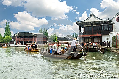 China traditional tourist boats on canals of Shanghai Zhujiajiao Water Town in Shanghai, China Editorial Stock Photo