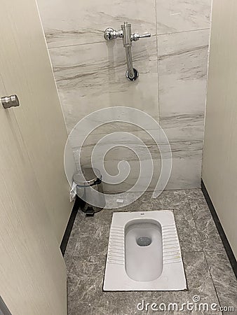 China Zhuhai Gongbei Port Border Gate Chinese Squat Toilet Squatting Bowl Water Flushing Device Bathroom Washroom Restroom Design Stock Photo