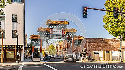 The chinatown gateway sculpture. It is at the entrance to the Old Town Chinatown neighborhood Editorial Stock Photo