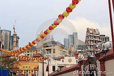 Chinatown Singapore Pagoda street with chinese lanterns and Gopuram tower of Sri Mariamman Temple Stock Photo