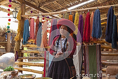 Chinchero, Cusco, Peru. December 2018, Process of natural dyeing of alpaca and llama wool, Quechua woman Editorial Stock Photo