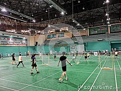 Chines people playing badminton in wuhan city Editorial Stock Photo