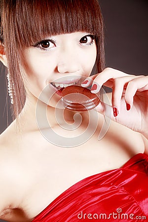 Chinese beauty eating pie Stock Photo