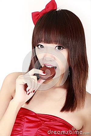 Chinese beauty eating pie Stock Photo