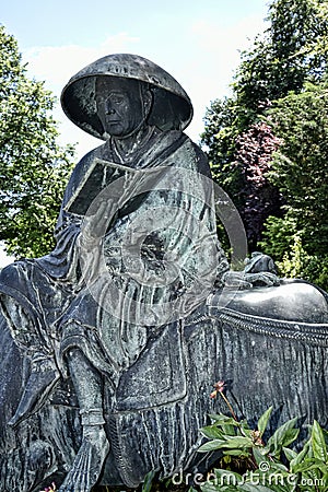 Chinese Bronze Statue in beautiful garden in West Yorkshire England Editorial Stock Photo