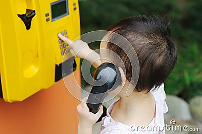 Chinese children make a telephone call Stock Photo