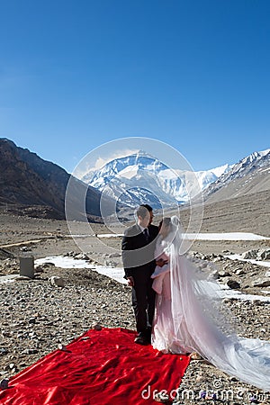 Chinese couple getting married at the Everest Editorial Stock Photo