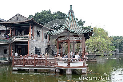 Chinese courtyard. pavilion and bridge. Editorial Stock Photo