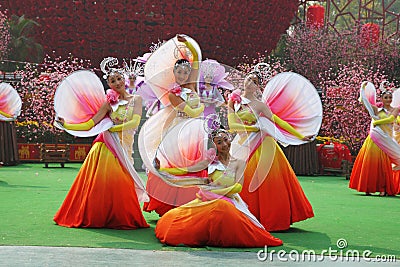 Chinese dance group in beautiful costumes Editorial Stock Photo