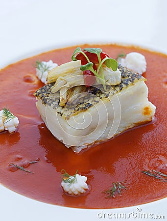 Chinese-dish fish: roasted gadus with tomato sauce Stock Photo
