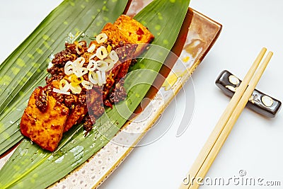 Chinese dishes two noodles yellow tofu Stock Photo